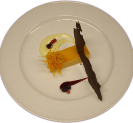 Gastronomía gourmet flan de coco y cardamomo